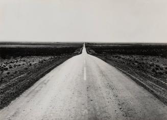 Portfolio box for "American Roads" portfolio with copy print of Dorothea Lange's "U.S. 54, North of El Paso, Texas"