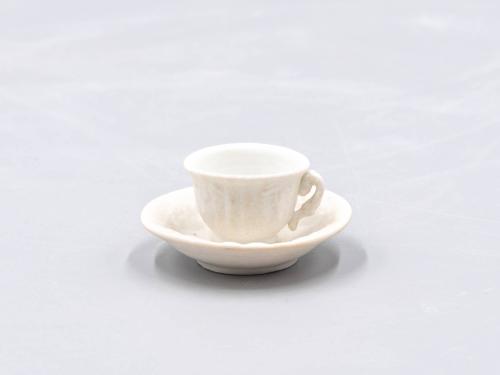 [Parian toy teacup and saucer]