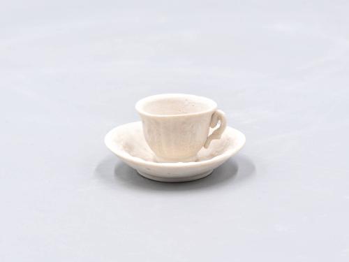 [Parian toy teacup and saucer]