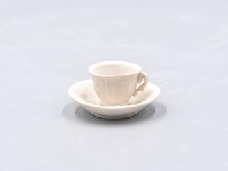 [Parian toy teacup and saucer]