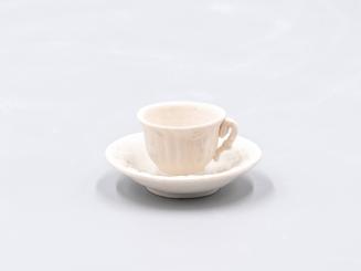 [Parian toy teacup and saucer]