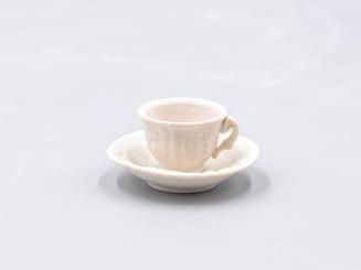 [Parian toy teacup and saucer]