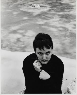 Portrait of woman with beads on rocks, Indiana