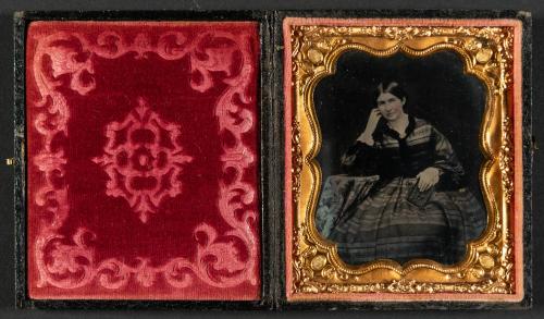 [Woman in striped dress]