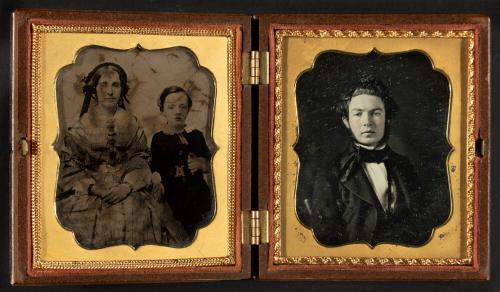 [Photo of a woman and boy and photo of a young man]