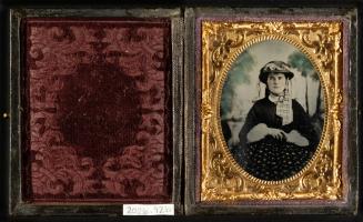 [Young woman in hat]