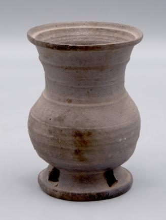 [Vase on pierced pedestal]