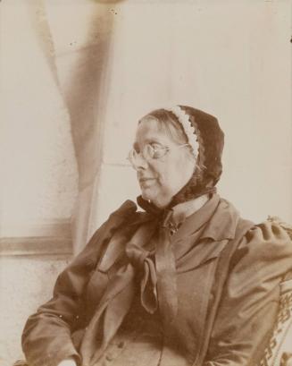 [Portrait of a seated woman]