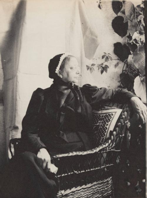 [Portrait of a seated woman]