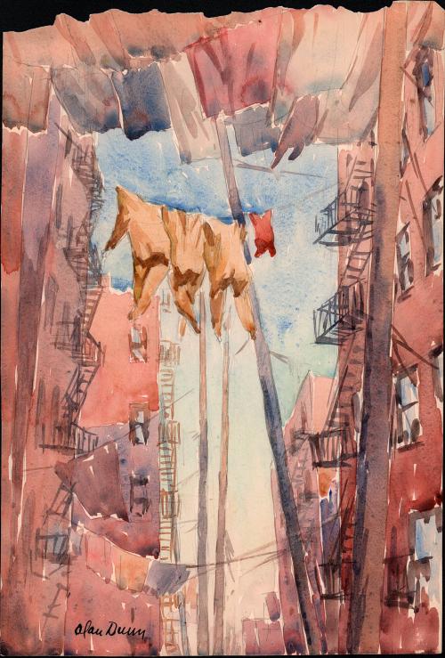 [Laundry hung between tall buildings]