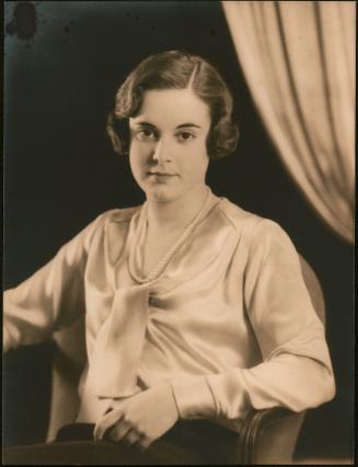 [Seated woman]
