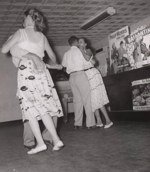 [Couples dancing]