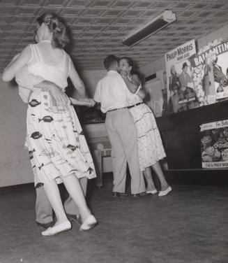 [Couples dancing]