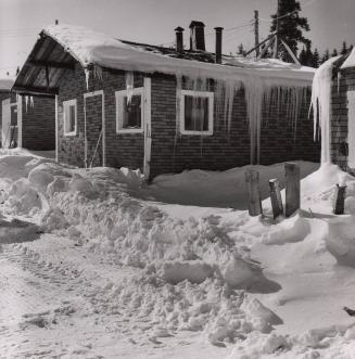 A lumber camp in winter