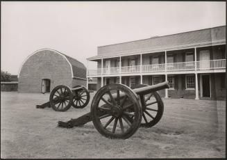 Two canons in front of officer's barracks (Virginia?)