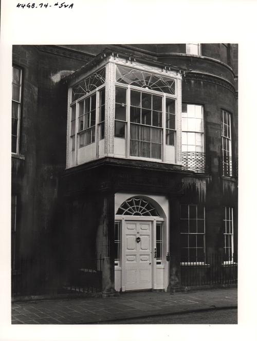 Doorway with enclosed porch overhead